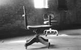 This is one of my earliest photos circa 1988. Abandoned warehouse in Chicago. These chairs are like old friends every time I look at this photo it is a reunion.