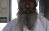 On train in Southern India.  He never said a word but initiated my taking his photo.