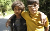 In Dharamsala on my walk on outskirts of town these boys stopped me to pose.  His glasses have no glass in them.