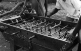 In Guinea, West Africa there was a foosball table on the street in my cartier.  Local kids are playing it here.  Guinea impressed me with how the people there figured out how to get buy or enjoy things with very little.  Or perhaps to enjoy what they did have.