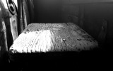 Old train. Wood seat in engine room. Perfect light and texture.